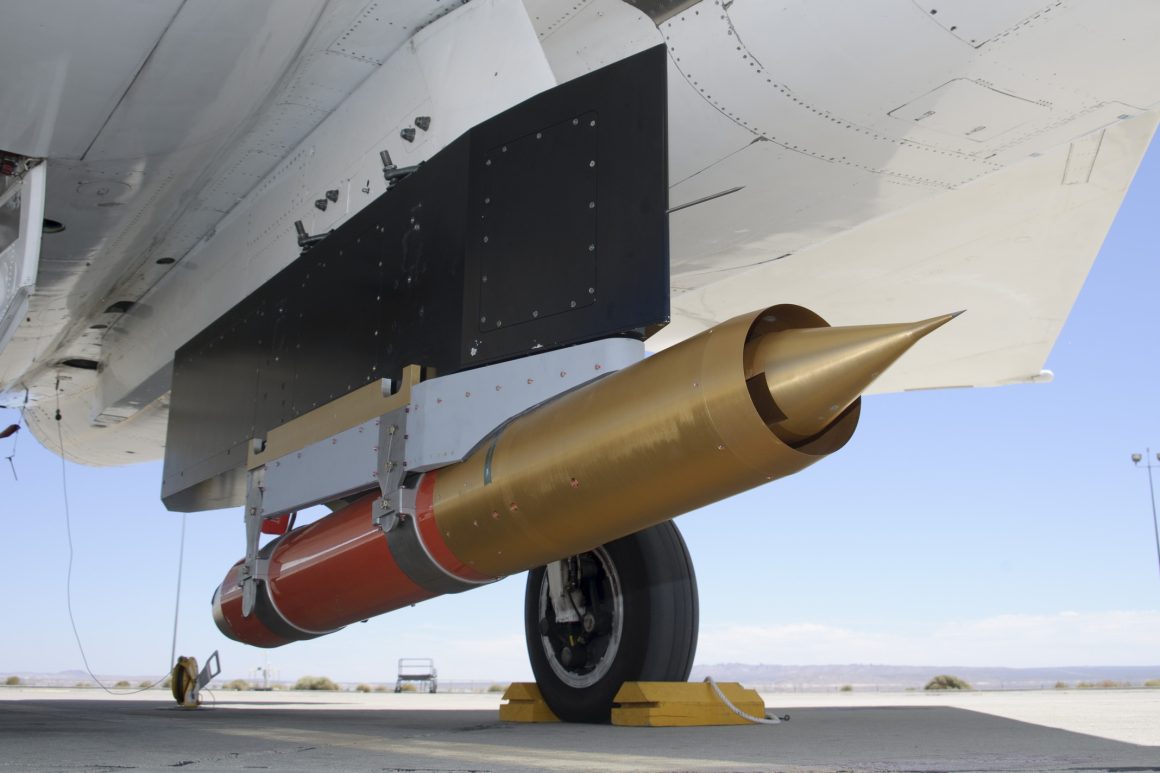 The channeled center-body inlet design, shown here in a subscale test version mounted underneath NASA's F-15B flight text fixture, could improve airflow and fuel efficiency of jet engines at a wide variety of speeds (NASA photo)