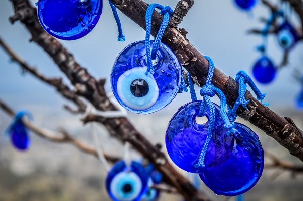 evil eye amulets on a tree