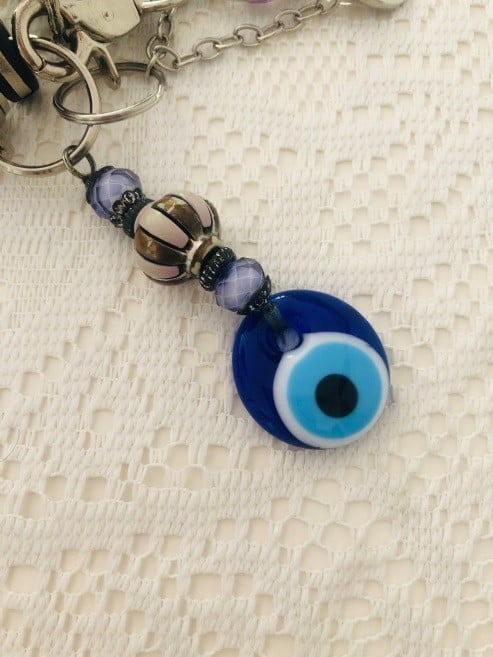 my evil eye amulet on a table